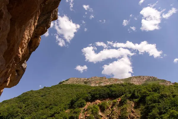 Beautiful green mountains against the blue sky. Gubinsky district. Azerbaijan.