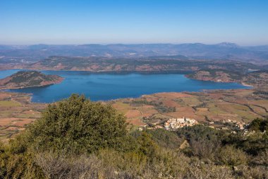 View from Mont Liausson over the small village of Liausson, on the shores of Lac du Salagou
