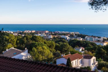 Landscape over the city with the sea as a horizon from the Montee des Pierres Blanches in Sete