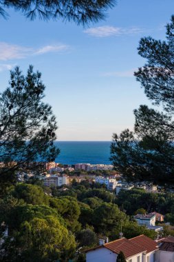 Landscape over the city with the sea as a horizon from the Montee des Pierres Blanches in Sete