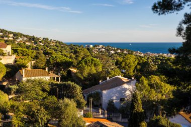 Landscape over the city with the sea as a horizon from the Montee des Pierres Blanches in Sete