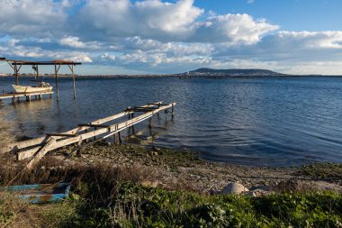 View of Mont Saint-Clair and the town of Sete from the oyster farmers' huts of Bouzigues, on the other side of the Etang de Thau