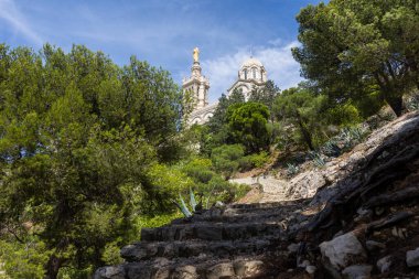 Summer view of the Basilica of Notre-Dame de la Garde from the Chemin du Bois Sacre