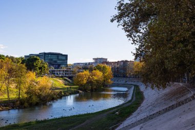 Montpellier Town Hall in autumn from the banks of the Lez
