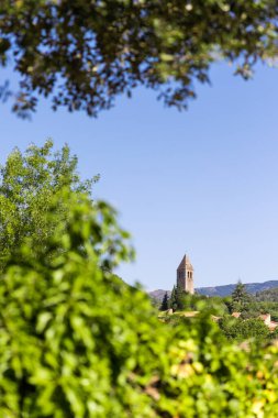 Sunny view of the Church of Saint-Laurent in Olargues in the Haut-Languedoc Regional Nature Park