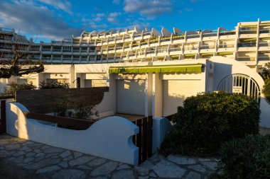 Detail of the facade of a building in the Couchant district, by the sea, in La Grande-Motte