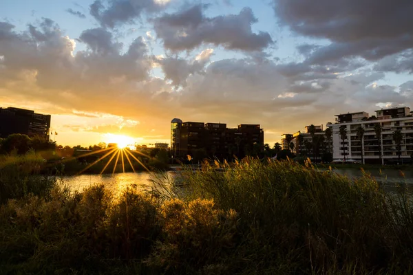 stock image Sunset on a cloudy day over the Bassin Jacques Coeur in the Port Marianne district of Montpellier