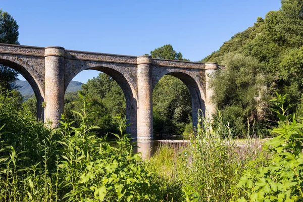 Ceps bridge in Roquebrun, a six-arched bridge dating from the 19th century and crossing the river Orb