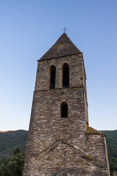 Bell tower of the Saint-Laurent Church in Olargues at sunset