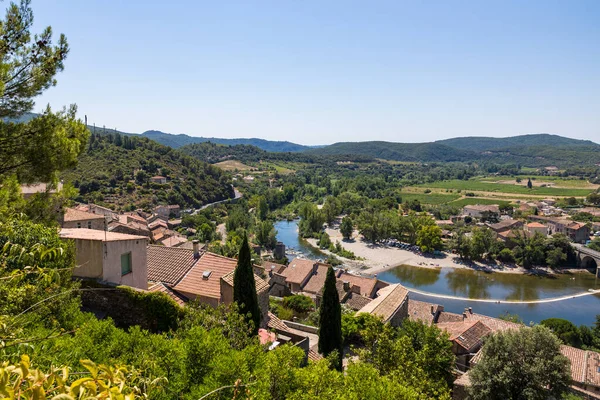 stock image View on the medieval village of Roquebrun and the Orb River from the Mediterranean Garden