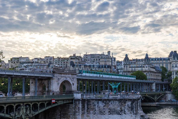 View of the Bir-Hakeim Bridge at the end of the day from the banks of the Seine