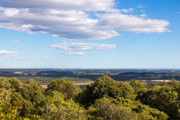 stock image View over the Languedoc plain to the sea from the Bois de Leque in Les Matelles