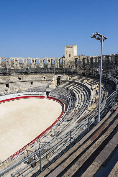 Arena of Arles arena and bleachers, dominated by a defense tower dating from the Middle Ages