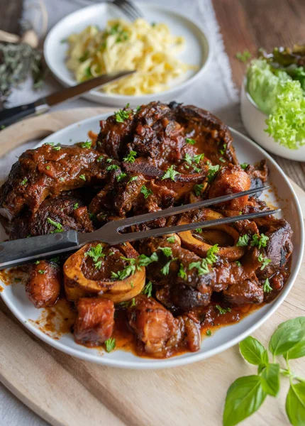 Sunday Holiday Meat Dish Braised Beef Shanks Pasta Wooden Table — Stock Photo, Image
