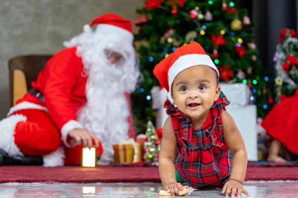 African American Baby Having Fun Playing Toys While Santa Claus — Zdjęcie stockowe