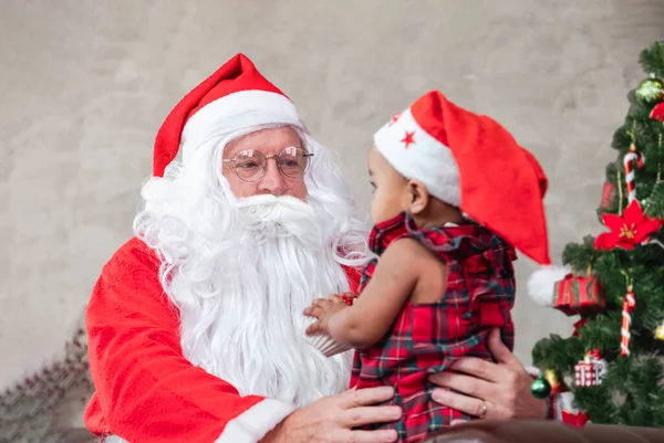 Santa Claus Lifting Happy Little Toddler Baby Girl Sitting His — Stock Photo, Image