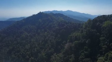 Aerial view of Doi Phu Kha National Park, Nan province, Thailand. The rolling tropical mountain scenery