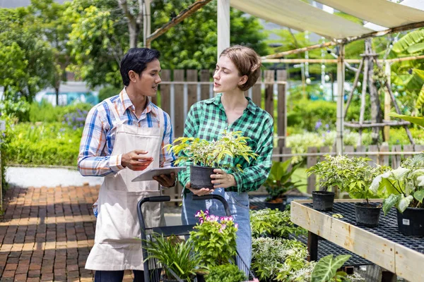 Young Caucasian Customer Asking Nursery Owner Exotic Plant Shopping Cart — Stock Photo, Image