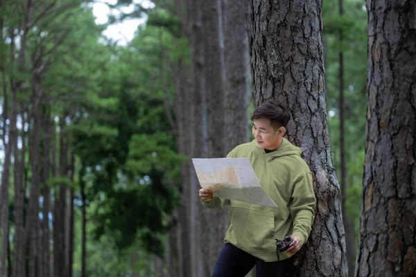 Asian Naturalist Looking Map Direction While Exploring Wildlife Pine Forest — Stock Photo, Image