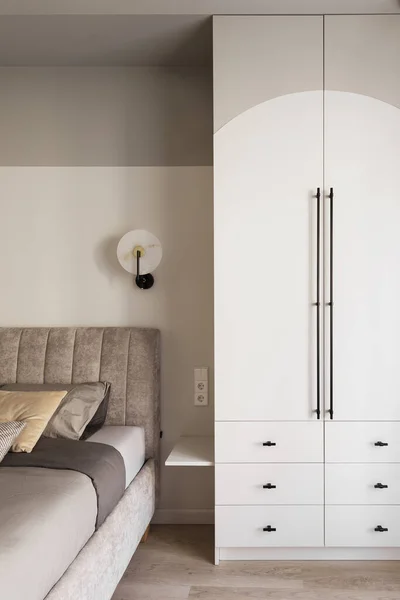 Modern minimalist aesthetic bedroom interior design in warm shades