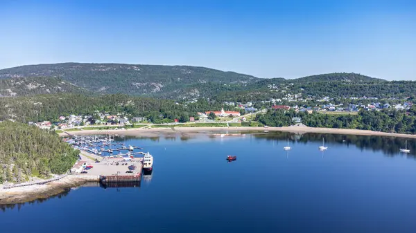 stock image Aerial view of Tadoussac bay taken by drone over the St-Lawrence river. View of Pointe-de-L'Islet trail.