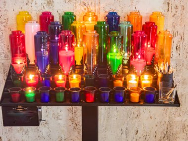 Prayer candles for pray and hope with god in church clipart