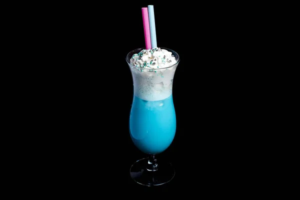 Chocolate blue cocktail drink with cream. Delicious chocolate cocktail, milkshake or smoothie. Black background.