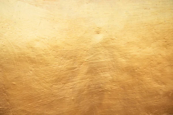 stock image Gold metal brushed background or texture of wall.