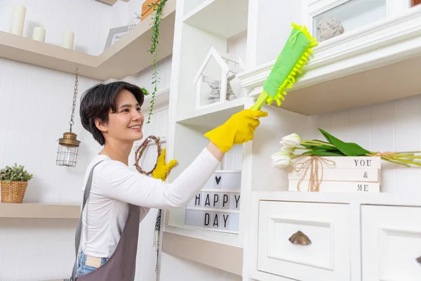 Woman Cleaning Dust Bookshelf Young Girl Sweeping Shelf Living Room Royalty Free Stock Images