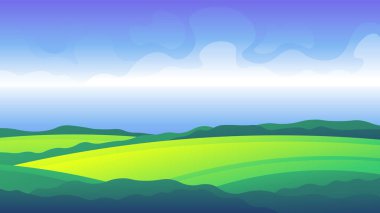 Deniz manzaralı yeşil çayırlar.