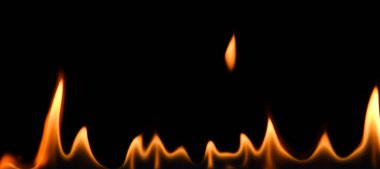 Close up line of fire flames pattern isolated on black background, low angle, side view