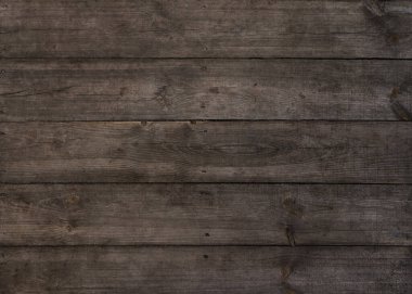 Eskimiş eskimiş kahverengi ahşap yüzeyin düğüm ve lekeli arka plan dokusunu kapat