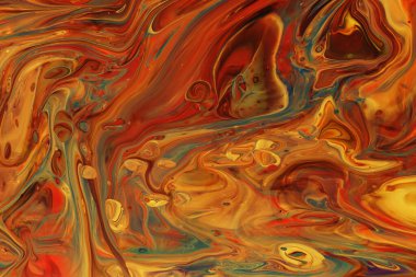 Golden orange and yellow abstract fluid art background of acrylic paint, with marbling effect, colorful bubbles and copy space