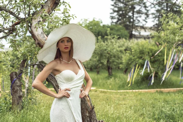 stock image Walk with a woman in an apple orchard