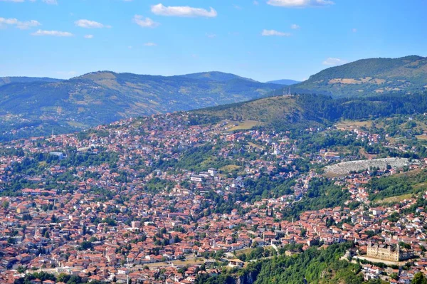 stock image Panoramic view over Sarajevo during summer, from mountain Trebevic. Travel to Europe ....