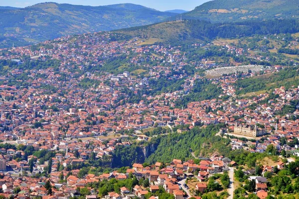 stock image Panoramic view over Sarajevo during summer, from mountain Trebevic. Travel to Europe ....