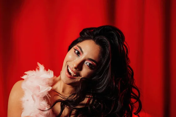Sensual Curly Black Hair Asian Woman Feather Boa Posing Red — Stockfoto