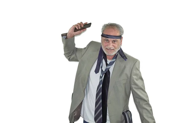 mature man with beard in a suit and many ties standing angry on a white background