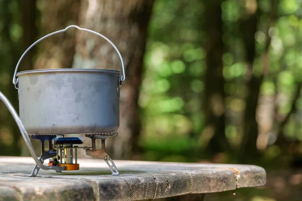 Titanium Pot Making Food Gas Stove Camping Wooden Table Forest —  Fotos de Stock