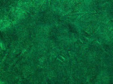 green velvet fabric texture used as background. Empty green fabric background of soft and smooth textile material. There is space for text..	
