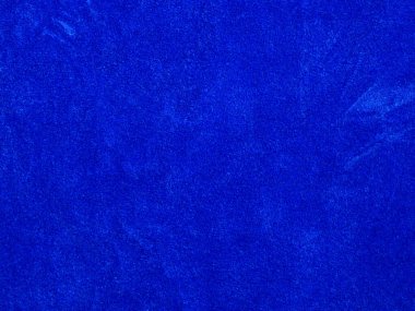 Blue velvet fabric texture used as background. Empty blue fabric background of soft and smooth textile material. There is space for text.	