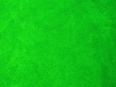 green velvet fabric texture used as background. Empty green fabric background of soft and smooth textile material. There is space for text..	