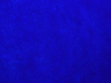Blue velvet fabric texture used as background. Empty blue fabric background of soft and smooth textile material. There is space for text.	