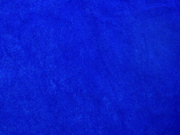 Blue velvet fabric texture used as background. Empty blue fabric background of soft and smooth textile material. There is space for text.	