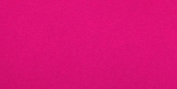Pink velvet fabric texture used as background. Empty pink fabric background of soft and smooth textile material. There is space for text..