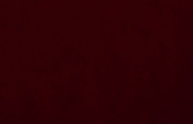 Dark red old  velvet fabric texture used as background. Red gradient fabric background of soft and smooth textile material. There is space for text.	