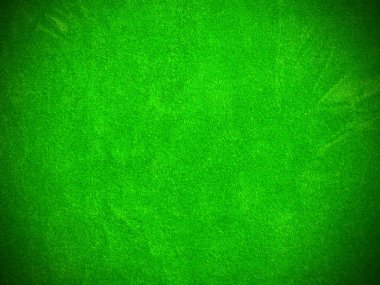 green velvet fabric texture used as background. Empty green fabric background of soft and smooth textile material. There is space for text..	