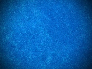 Arka plan olarak kullanılan açık mavi kadife kumaş dokusu. Yumuşak ve pürüzsüz tekstil malzemesinin boş açık mavi kumaş arkaplanı. 