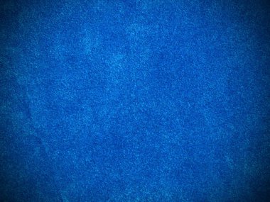 Arka plan olarak kullanılan açık mavi kadife kumaş dokusu. Yumuşak ve pürüzsüz tekstil malzemesinin boş açık mavi kumaş arkaplanı. 