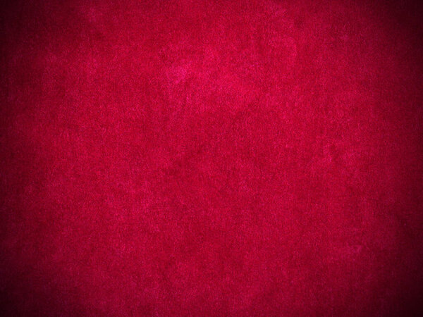 Красная бархатная ткань текстура используется в качестве фона. Пустой красный тканевый фон из мягкого и гладкого текстильного материала. Есть место для текста.